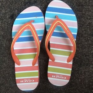 coach multi colored striped flip flops